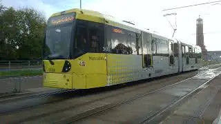 Two trams crossing each other between Trafford Centre and Barton Dock Road tram stops