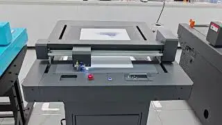 Teneth flatbed cutting machine.