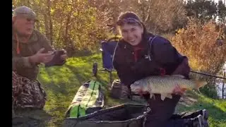 Nic the carp girl in action with some help from Mick