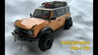 Ford Bronco TRX-4 driving in snow after a snowstorm