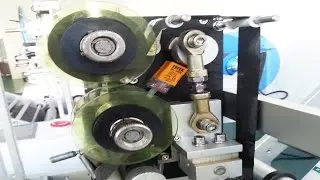 Installation of labeling machine bottles labeler equipment with coding printer demo video of how to