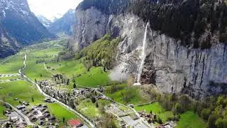 Aerial Footage Of A Village Built In A Valley Between Mountains (Full HD)