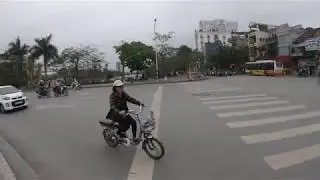 Crossing the road in Hai Phong, Vietnam (4k)