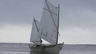Sailing The Rigolets on at light breeze at dawn