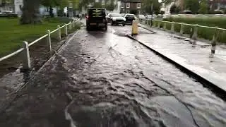 Flooded road after heavy shower in Kew II, Richmond, Surrey, UK, 10/05/23 #rain #kewgardens #flood