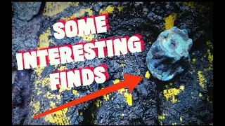 The metal detector is in the dirt, but there are finds