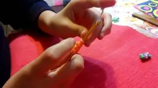 Como hacer mariposas con elasticos sin telar