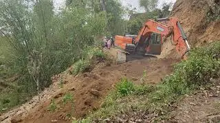 JCB Excavator: Building Vital Roads for Hilly Villagers!