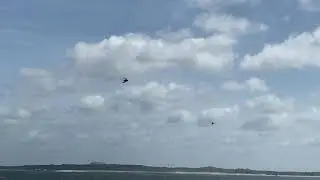 The hover cross manoeuvre featuring two RSAF AH-64D Apache helicopters and one F-15SG fighter jet