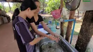 Cooking frogs and Grasshopper for Breakfast with Lao farmer. Laos country food