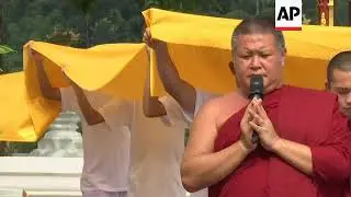 Thai cave boys and their coach attend Buddhist temple ceremony