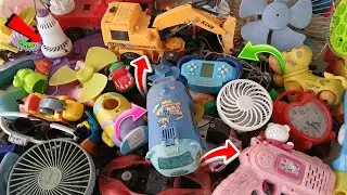 Discovering old items | Found a video game console, excavator & other toys, and an old mini fan.
