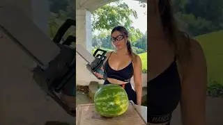CUTTING WATERMELON WITH CHAINSAW