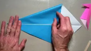 Origami pecking bird traditional