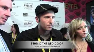 BEHIND THE RED DOOR