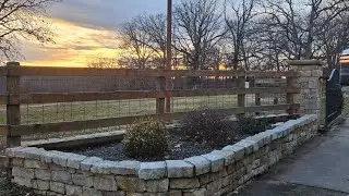Power Washing Black Molded Brick Retaining Wall after soaking in solution