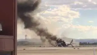 Fire and evacuation of BA2276, showing emergency slide deployment