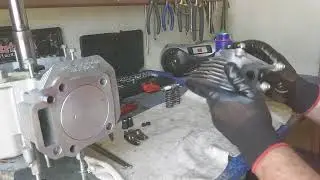 Installation of inlet/exhaust valves on a Torx PX200-3 lawnmower engine.