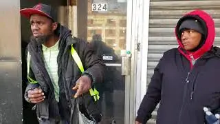Black man smoking crack while explaining the black plight