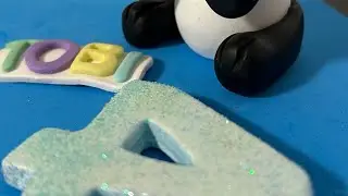 Cake TOPPER with panda, birthday candle holder and name in cold porcelain (in progress)