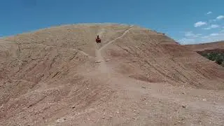 Quad riding steep slope in Ait Ben Haddou
