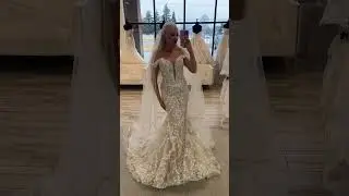 Perfect for brides seeking a romantic,form-fitting silhouette with intricate lace & cathedral train