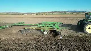 8400 John Deere disking potato ground