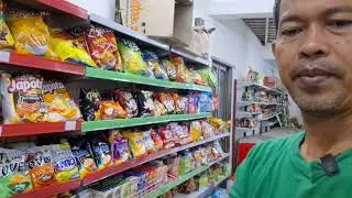 Menata merapikan display minuman stok minim