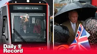 King Charles drives tram-train as he celebrates 77th birthday with visit to Wales