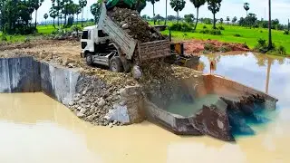 Amazing project with the new job build the road around the lack by bulldozer push big stone in water