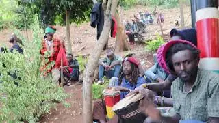 Youth breaks into a song during Mau Mau remembrance day