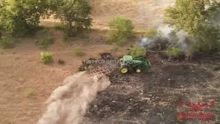 07-20-2022 Decatur, TX  - Farmer plows field to prevent fire spread after lightning strike