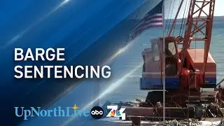 Owner of barge in Grand Traverse Bay now has one year to move or sell it