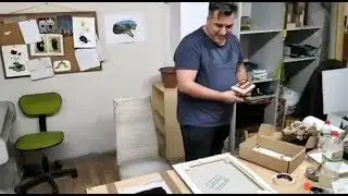 Signing canvas paintings with BigStamping giant stamps