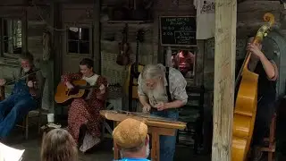 Homestead Pickers bluegrass band with hammered dulcimer instrument at Silver Dollar City, Branson MO