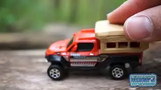 Small Toy Cars Moving on a Felled Tree and Fall Down
