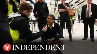 Sunak laughs with Border Force officers after Rwanda bill passes through Commons