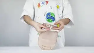 One piece twist tie closure ostomy bag