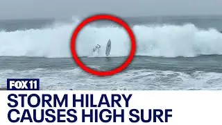 Surfers catch California waves as Hilary approaches