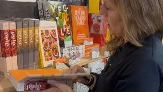 Abra Berens signing books at Zingerman's Deli