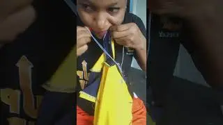 Fixing fallen botton on my baby&rsquo;s uniform 