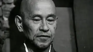 Shunryu Suzuki Roshi meditates