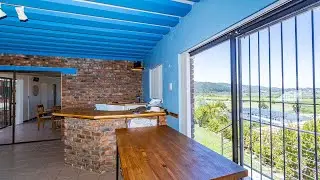 Low-maintenance facebrick home situated on a hilltop.