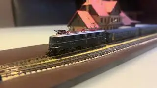 SBB Ae 6/6 with 2 SBB 1st & 2nd class passenger cars Short stop at small station Stop. Gauge Z