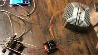 ZVS driver driving a step-up transformer making wire glow like a lightbulb.