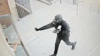 Man in gas mask storms courthouse with pepper spray