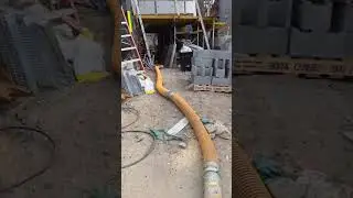 Sucker Truck Cleaning Wet Concrete Slurry Inside Construction Site