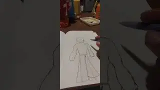 Me drawing which is what I like to do.