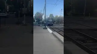 Electric Tram at East Blvd Railroad Crossing in Charlotte, NC