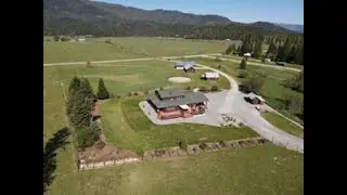 Home on 15 acres with a creek in Priest River Idaho 83856
